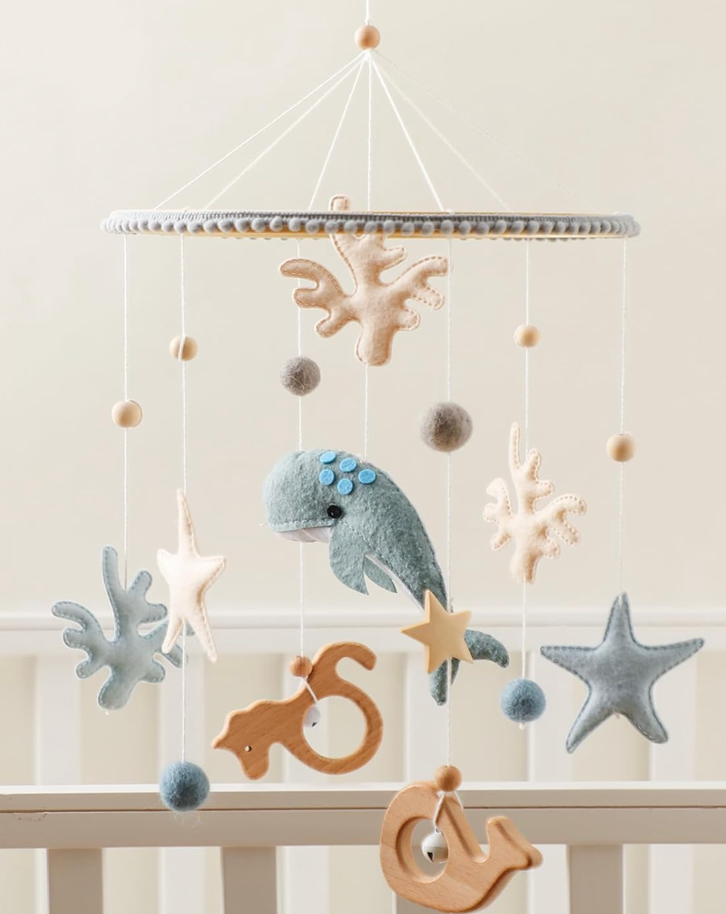 Handmade wooden and felt ocean whale crib mobile